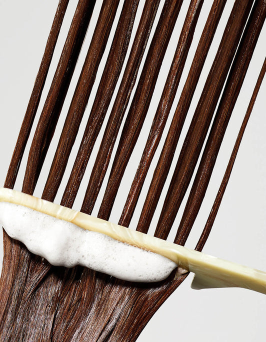 Thickening Conditioner with comb through hair